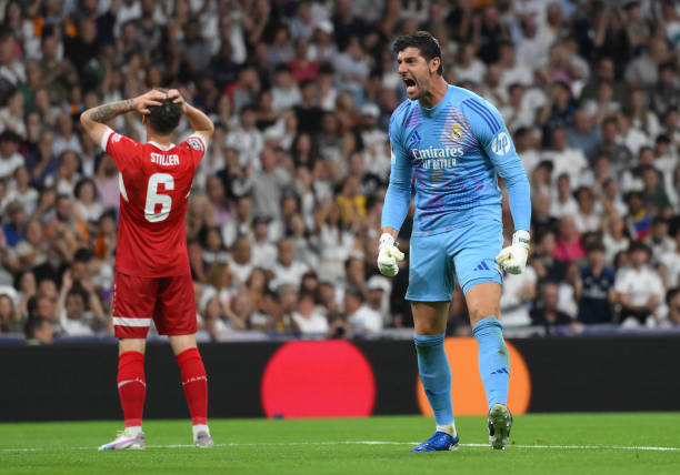 Real Madrid vs Stuttgart Review: Thibaut Courtois reacts during the UEFA Champions League 2024/25 League Phase MD1 match between Real Madrid and Stuttgart at Estadio Santiago Bernabeu on September 17, 2024 in Madrid, Spain.