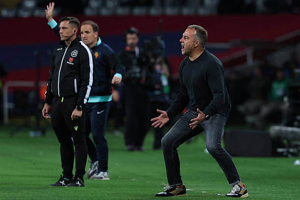 Barcelona vs Mallorca Review: Hansi Flick shouts instructions to his players during the La Liga match between Barcelona and Mallorca at the Estadi Olimpic Lluis Companys on April 22, 2025.