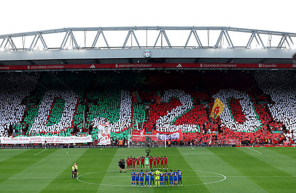 Liverpool vs Bournemouth Review: Players, match officials and fans take part in a minute's silence as a fan mosaic depicting "DJ20" is displayed in memory of Diogo Jota and his brother Andre Silva prior to the Premier League match between Liverpool and Bournemouth at Anfield on August 15, 2025.