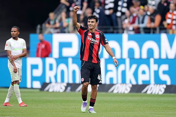 Bundesliga Roundup, Matchday 1: Can Uzun celebrates during the Bundesliga match between Eintracht Frankfurt and Werder Bremen at the Deutsche Bank Park on August 23, 2025.