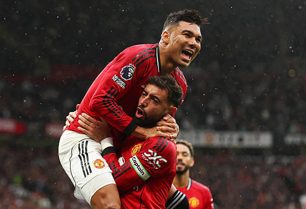 Manchester United vs Burnley Review: Casemiro and Bruno Fernandes celebrate after Josh Cullen scores an own goal during the Premier League match between Manchester United and Burnley at Old Trafford on August 30, 2025.