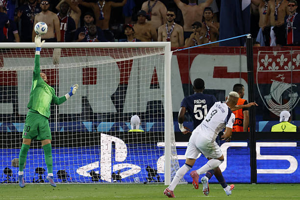 PSG vs Tottenham Review: Lucas Chevalier tips Richarlison's shot over the bar during the UEFA Super Cup final match between PSG and Tottenham at the Bluenergy Stadium on August 13, 2025.