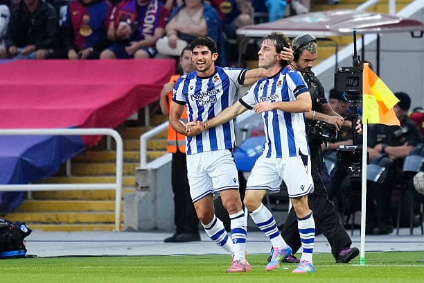 Barcelona vs Real Sociedad Review: Alvaro Odriozola celebrates his goal during the La Liga match between Barcelona and Real Sociedad at the Estadi Olimpic Lluis Companys on September 28, 2025.