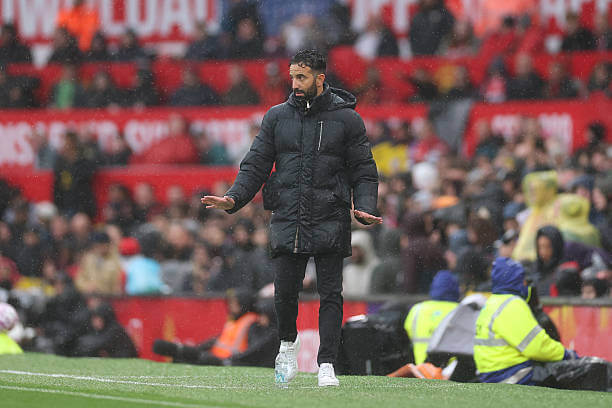 Manchester United vs Chelsea Review: Ruben Amorim interacts with his players during the Premier League match between Manchester United and Chelsea at Old Trafford on September 20, 2025.