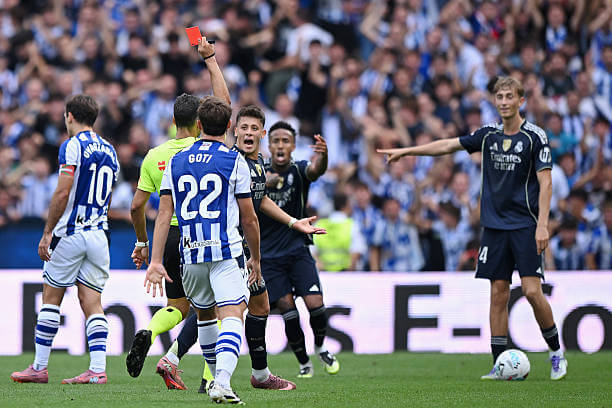 Real Sociedad vs Real Madrid Review: Referee Jesus Gil shows Dean Huijsen a red card during the La Liga match between Real Sociedad and Real Madrid at the Reale Arena on September 13, 2025.