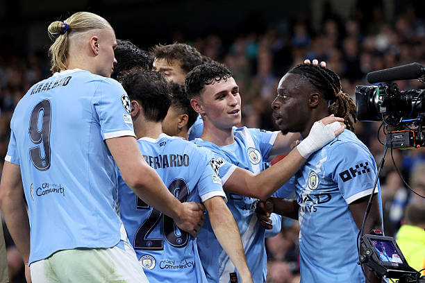Manchester City vs Napoli Review: Jeremy Doku celebrates his goal with his teammates during the UEFA Champions League 2025/26 League Phase MD1 match between Manchester City and Napoli at the Etihad Stadium on September 18, 2025.
