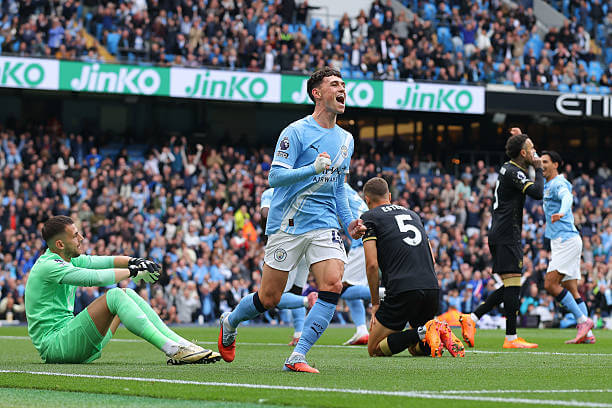 Manchester City vs Burnley Review: Phil Foden celebrates after an own goal by Maxime Esteve during the Premier League match between Manchester City and Burnley at the Etihad Stadium on September 27, 2025.