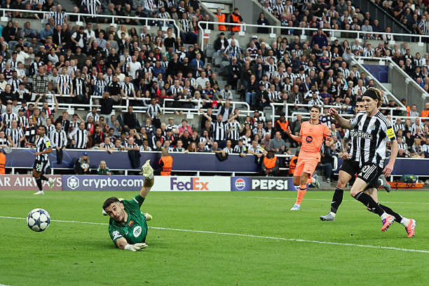 Newcastle vs Barcelona Review: Anthony Gordon scores during the UEFA Champions League 2025/26 League Phase MD1 match between Newcastle and Barcelona at St James' Park on September 18, 2025.