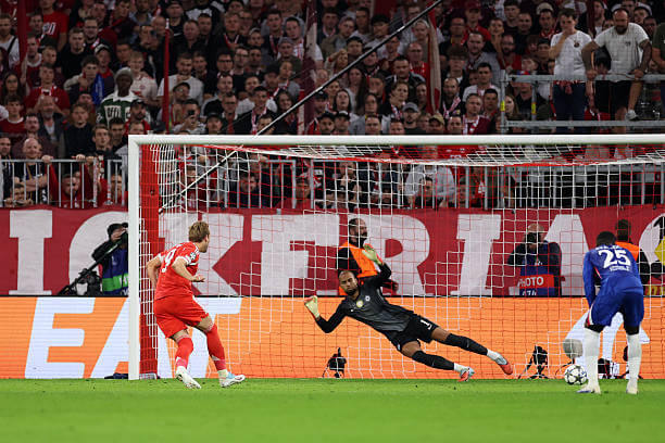Bayern Munich vs Chelsea Review: Harry Kane scores his first goal of the game from the penalty spot during the UEFA Champions League 2025/26 League Phase MD1 match between Bayern Munich and Chelsea at the Allianz Arena on September 17, 2025.