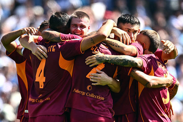 Lazio vs AS Roma Review: Lorenzo Pellegrini celebrates his goal with his teammates during the Serie A match between Lazio and AS Roma at the Stadio Olimpico on September 21, 2025.