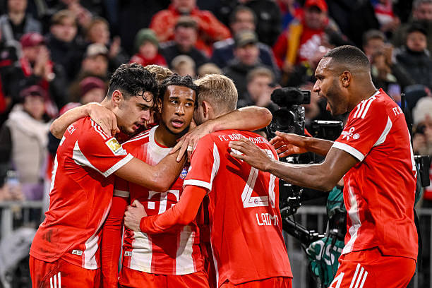 Bayern Munich vs Dortmund Review: Michael Olise celebrates his goal with his teammates during the Bundesliga match between Bayern Munich and Dortmund at the Allianz Arena on October 18, 2025.