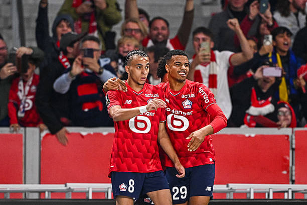 Ligue 1 Roundup, Matchday 7: Ethan Mbappe celebrates his goal with his teammate during the Ligue 1 match between Lille and Paris Saint-Germain at Stade Pierre Mauroy on October 5, 2025.