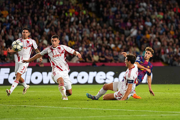 Barcelona vs Olympiacos Review: Fermin Lopez scores his second goal of the game during the UEFA Champions League 2025/26 League Phase MD3 match between Barcelona and Olympiacos at the Estadi Olimpic Lluis Companys on October 21, 2025.