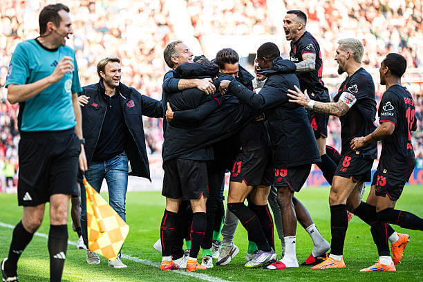 Bundesliga Roundup, Matchday 7: Martin Terrier celebrates his goal with his teammates during the Bundesliga match between Mainz 05 and Bayer Leverkusen at MEWA Arena on October 18, 2025.
