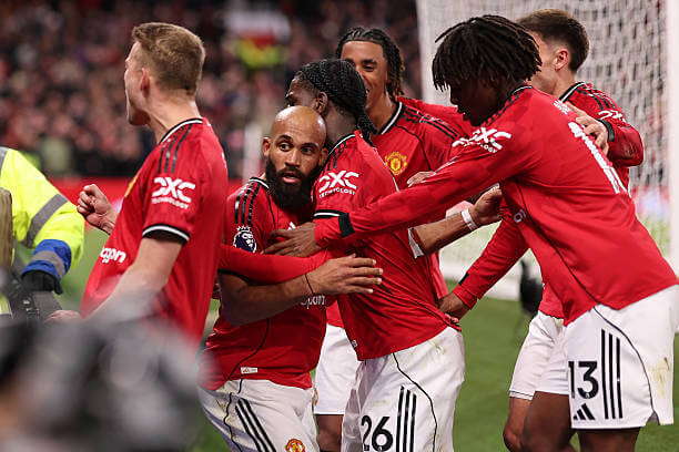 Manchester United vs Brighton Review: Bryan Mbeumo celebrates his second goal of the game with his teammates during the Premier League match between Manchester United and Brighton at Old Trafford on October 25, 2025.