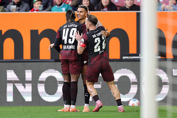 Bundesliga Roundup, Matchday 8: Antonio Nusa celebrates his goal with his teammates during the Bundesliga match between FC Augsburg and RB Leipzig at WWK-Arena on October 25, 2025.