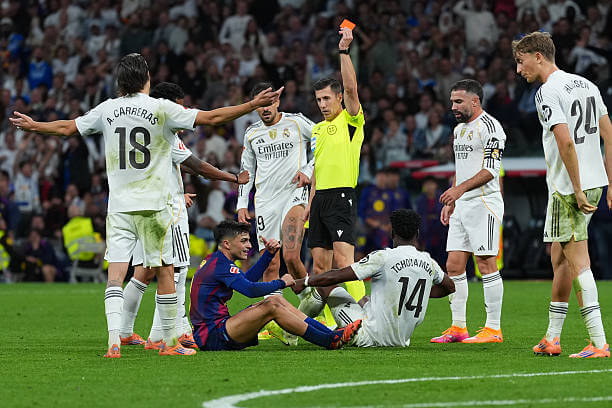 Real Madrid vs Barcelona Review: Referee Cesar Soto Grado shows a red card to Pedri during the La Liga match between Real Madrid and Barcelona at the Santiago Bernabeu on October 26, 2025.