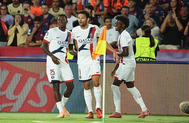 Barcelona vs PSG Review: Goncalo Ramos celebrates his goal with Nuno Mendes and Quentin Ndjantou during the UEFA Champions League 2025/26 League Phase MD2 match between Barcelona and PSG at the Estadi Olimpic Lluis Companys on October 01, 2025.