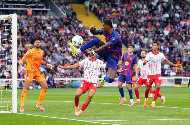 Barcelona vs Girona Review: Marcus Rashford in action during the La Liga match between Barcelona and Girona at the Estadi Olímpic Lluís Companys on October 18, 2025.