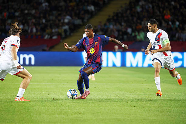 Barcelona vs PSG Review: Marcus Rashford in action during the UEFA Champions League 2025/26 League Phase MD2 match between Barcelona and PSG at the Estadi Olimpic Lluis Companys on October 01, 2025.