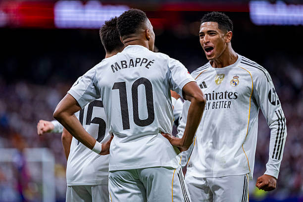 Real Madrid vs Barcelona Review: Jude Bellingham celebrates with Kylian Mbappe during the La Liga match between Real Madrid and Barcelona at the Santiago Bernabeu on October 26, 2025.