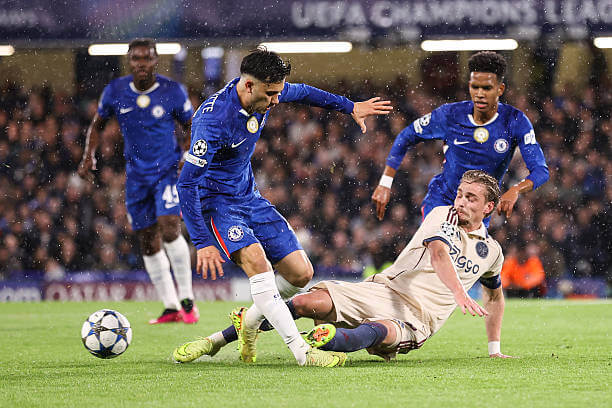 Chelsea vs Ajax Review: Kenneth Taylor fouls Facundo Buonanotte resulting in a red card for the Ajax midfielder during the UEFA Champions League 2025/26 League Phase MD3 match between Chelsea and Ajax at Stamford Bridge on October 22, 2025.