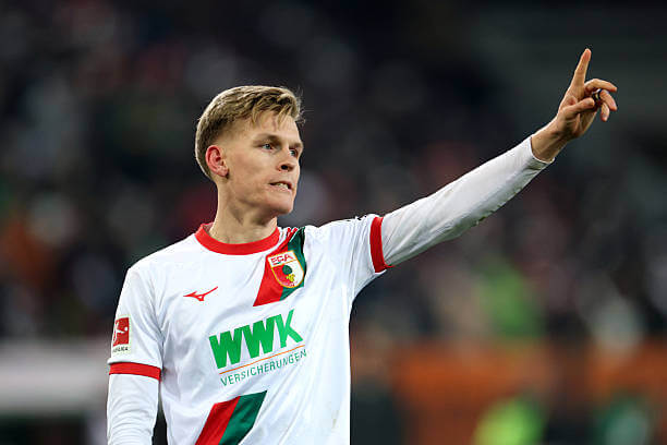 Bundesliga Roundup, Matchday 11: Anton Kade celebrates his goal during the Bundesliga match between Augsburg and Hamburger SV at the WWK-Arena on November 22, 2025.