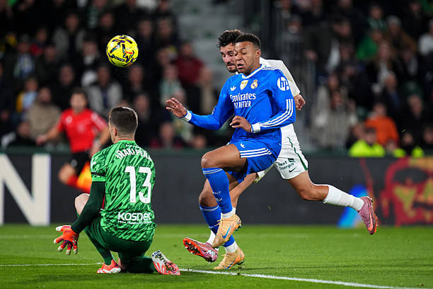 Elche vs Real Madrid Review: Kylian Mbappe has his shot at goal blocked by Inaki Pena during the La Liga match between Elche and Real Madrid at the Estadio Manuel Martinez Valero on November 23, 2025..