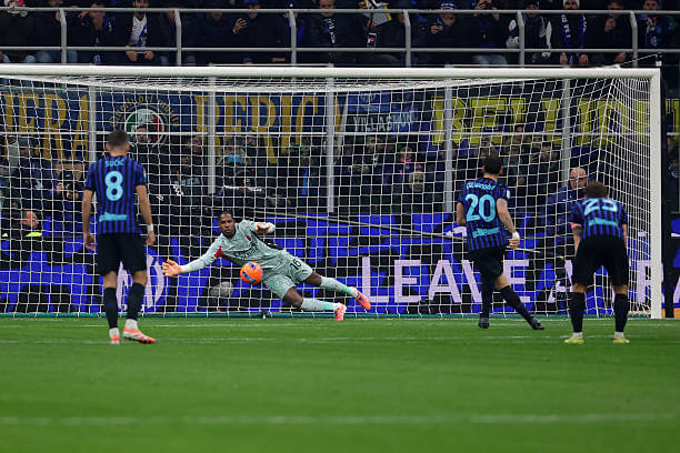 Inter vs AC Milan Review: Mike Maignan saves Hakan Calhanoglu's penalty kick during the Serie A match between Inter and AC Milan at the Giuseppe Meazza on November 23, 2025.