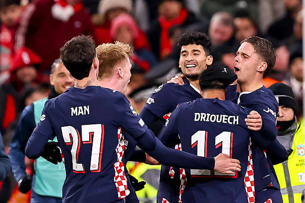 Liverpool vs PSV Review: PSV Eindhoven players celebrate during the UEFA Champions League 2025/26 League Phase MD5 match between Liverpool and PSV Eindhoven at Anfield on November 26, 2025.