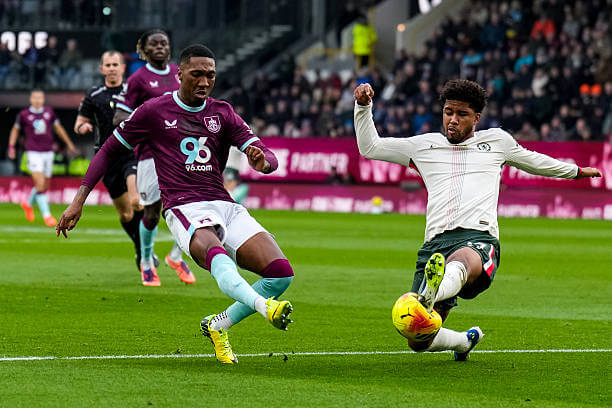 Burnley vs Chelsea Review: Andrey Santos blocks the attempt of Jaidon Anthony during the Premier League match between Burnley and Chelsea at Turf Moor on November 22, 2025.