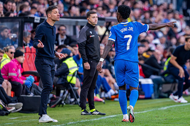 La Liga Roundup, Matchday 12: Vinicius Junior interacts with Xabi Alonso during the La Liga football match between Rayo Vallecano and Real Madrid at Estadio Vallecas on November 09, 2025.