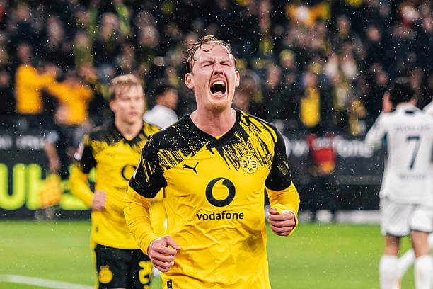 Bundesliga Roundup, Matchday 13: Julian Brandt celebrates his goal during the Bundesliga match between Dortmund and Hoffenheim at the Signal Iduna Park on December 7, 2025.