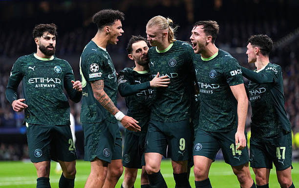 Real Madrid vs Manchester City Review: Erling Haaland celebrates his goal with his teammates during the UEFA Champions League 2025/26 League Phase MD6 match between Real Madrid and Manchester City at the Santiago Bernabeu on December 10, 2025.