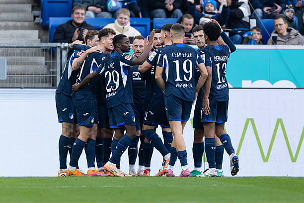 Bundesliga Roundup, Matchday 12: Hoffenheim players celebrate during the Bundesliga match between Hoffenheim and Augsburg at PreZero-Arena on November 29, 2025.
