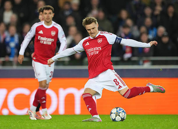 Club Brugge vs Arsenal Review: Martin Odegaard shoots during the UEFA Champions League 2025/26 League Phase MD6 match between Club Brugge and Arsenal at Jan Breydel Stadion on December 10, 2025.