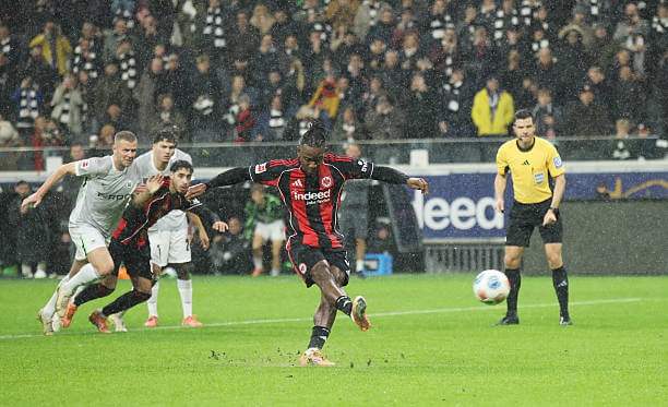 Bundesliga Roundup, Matchday 12: Michy Batshuayi scores from the penalty spot during the Bundesliga match between Frankfurt and Wolfsburg at Deutsche Bank Park on November 30, 2025.