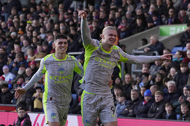 Crystal Palace vs Manchester City Review: Erling Haaland celebrates with Phil Foden during the Premier League match between Crystal Palace and Manchester City at Selhurst Park on December 14, 2025.
