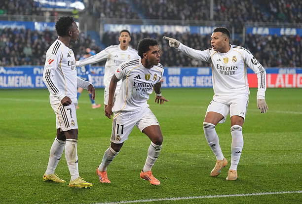Alaves vs Real Madrid Review: Rodrygo celebrates his goal with Vinicius Junior and Kylian Mbappe during the La Liga match between Alaves and Real Madrid at the Mendizorroza on December 14, 2025.