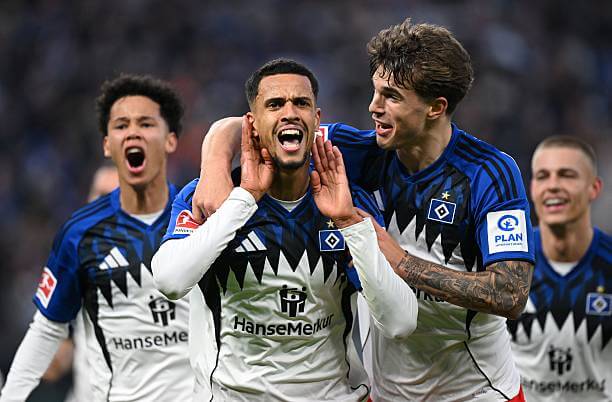 Bundesliga Roundup, Matchday 12: Robert Glatzel celebrates his goal with his teammates during the Bundesliga match between Hamburger SV and VfB Stuttgart at the Volksparkstadion on November 30, 2025.