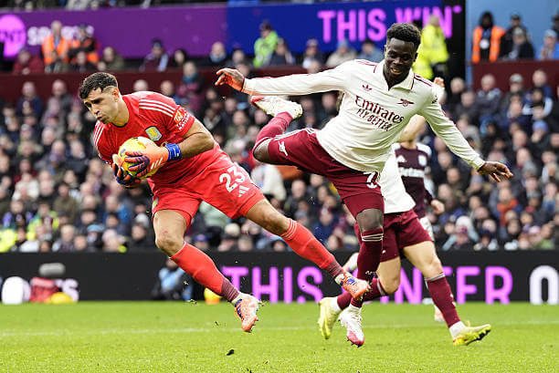 Aston Villa vs Arsenal Review: Emiliano Martinez makes a save during the Premier League match between Aston Villa and Arsenal at Villa Park on December 06, 2025.