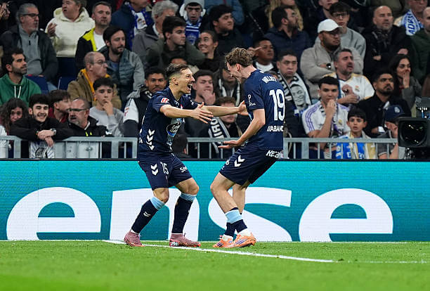 Real Madrid vs Celta Vigo Review: Williot Swedberg celebrates his first goal of the game with Bryan Zaragoza during the La Liga match between Real Madrid and Celta Vigo at the Santiago Bernabeu on December 7, 2025.