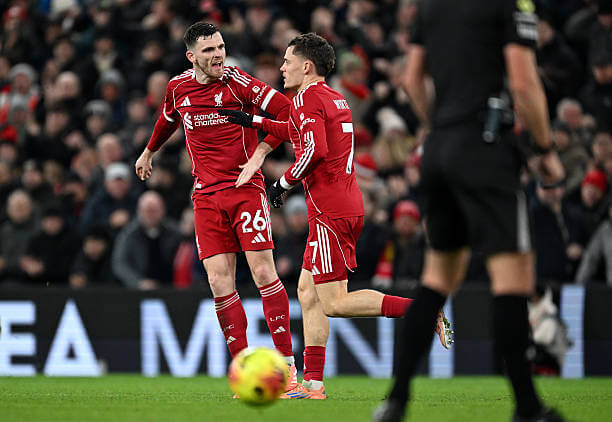 Liverpool vs Sunderland Review: Florian Wirtz celebrates with Andrew Robertson during the Premier League match between Liverpool and Sunderland at Anfield on December 03, 2025.