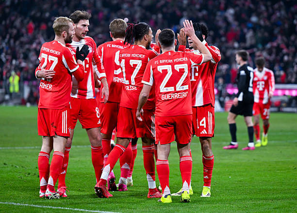 Bundesliga Roundup, Matchday 16: Bayern Munich players celebrate during the Bundesliga match between Bayern Munich and Wolfsburg at the Allianz Arena on January 11, 2026.